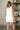 Macie White Dandelion Scallop Mini Skirt- full back view