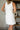 Macie White Dandelion Scallop Mini Skirt- back view
