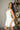 Dalia White Buttoned Flare Mini Dress- frontal side view