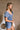 Patricia Washed Denim Puff Sleeve Romper - side view