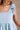 Breana Denim Ruffle Romper - close up neckline view