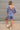 Charlie Dusty Indigo Short Sleeve Romper- full body back view