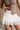 Lara Cream Lace Tiered Mini Skirt- close up front view