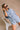 Brooklyn Washed Denim Short Sleeve Romper- frontal top view
