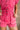 Victoria Pink Washed Denim Romper- close up frontal top view