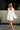 Brenna Cream Scarf Draped Mini Dress - back view