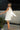 Brenna Cream Scarf Draped Mini Dress - back/side view