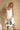 Piper White Flare Mini Dress- close up top view
