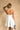 Piper White Flare Mini Dress- back view