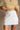 Emmy White Linen Mini Skirt - front 