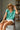 Tomi Emerald Sleeveless Knit Top - front sitting view