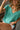Tomi Emerald Sleeveless Knit Top - close up sitting view