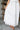 Sara White Eyelet Strapless Midi Dress -close up lower body