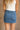 Mica: Brenna Denim Drawstring Mini Skirt - back view