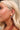 Helena Tortoise Hoop Earrings -close close up view on model