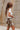 Sutton Brown & White Cow Mini Skirt- side view