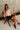 Jessica Black Faux Leather Skort - sitting view
