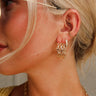 Cora Gold Dimensional Shape Open Hoop Earrings - frontal side view on model
