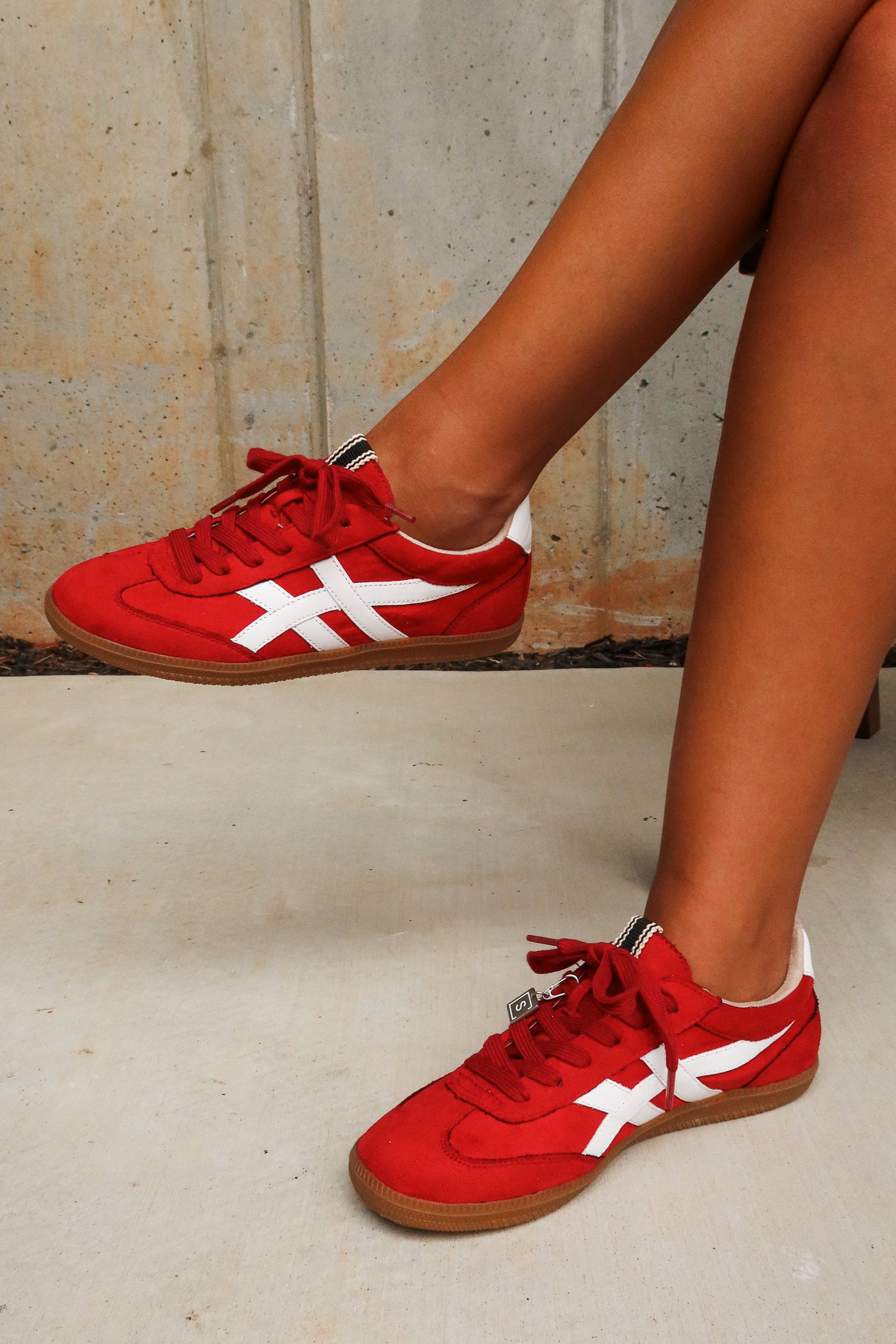 Shu Shop Sasha Red Suede Sneaker- frontal right side angle view