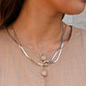 Maeve Gold & Silver Knot Layered Necklace- close up on model