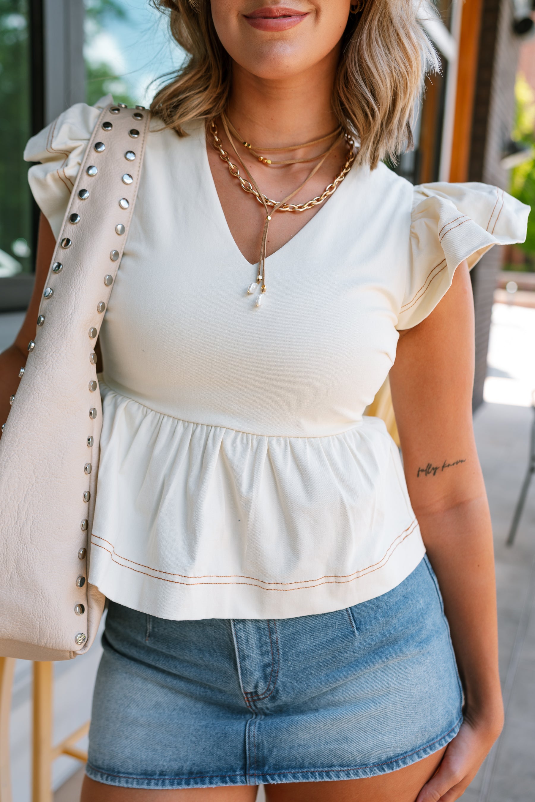Tory Cream Denim Ruffled Peplum Top - close front view
