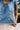 Savanna Blue Denim Embroidered Top - close up of hemline on model