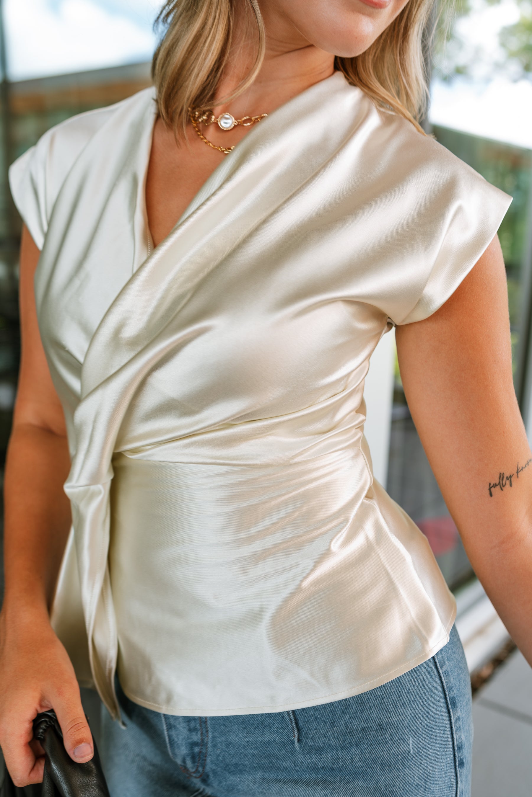 Liana Ivory Satin Twist Sleeveless Top- frontal side view