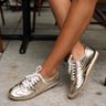 Dolce Vita Delany Light Gold Crinkle Patent Sneaker- frontal side full body view