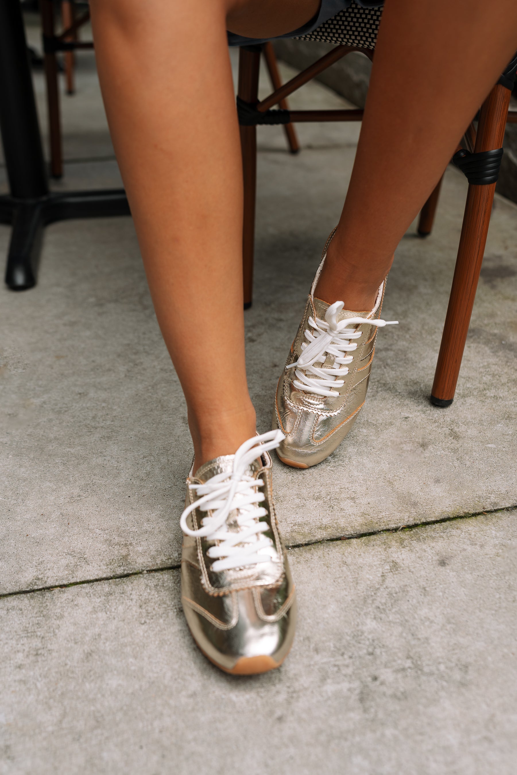 Dolce Vita Delany Light Gold Crinkle Patent Sneaker- front close up view