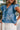Savanna Blue Denim Embroidered Top - close up frontal side view on model