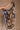 Botanical Navy & Orange Printed Satin Scarf -close up view  held by model