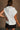 Zoe White Hoodie Sleeveless Tank- close up back view