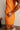 Layla Orange Shorts- close up side view