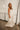 Rosa Ivory Satin Tiered Maxi Dress - full body side view