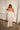 Rosa Ivory Satin Tiered Maxi Dress - full body back view