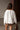 Anastasia White Ruffle Trim Top - back view