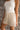 Tarah Beige & White Striped Shorts - frontal side view