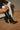 Tessa Black Knee High Boots - side view on model