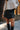 Shelly Black Faux Mini Skort - Close up front view