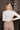Juliette Cream Pearl Mock Neck Top- close up back view