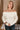 Raya Ivory Fringe Off-The-Shoulder Sweater- front view