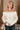 Raya Ivory Fringe Off-The-Shoulder Sweater- front view