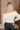 Raya Ivory Fringe Off-The-Shoulder Sweater- top back view