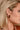 Rowan Brown Acrylic Hoop Earrings - close up side view on model