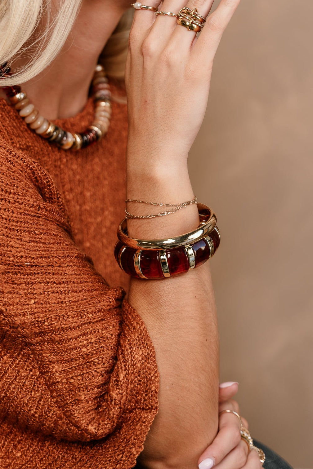 Joanie Brown & Gold Bangle Set - close up on model