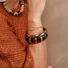 Joanie Brown & Gold Bangle Set - close up on model