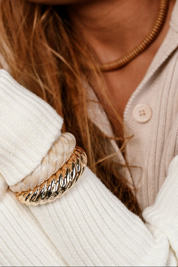 close up of Renee Beige & Gold Roped Bangle Set on model