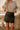 Ava Black Faux-Leather Lace Trim Skirt - front view