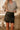Ava Black Faux-Leather Lace Trim Skirt - front view