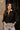 Dalia Black Quarter Zip-Up Top- close up top view